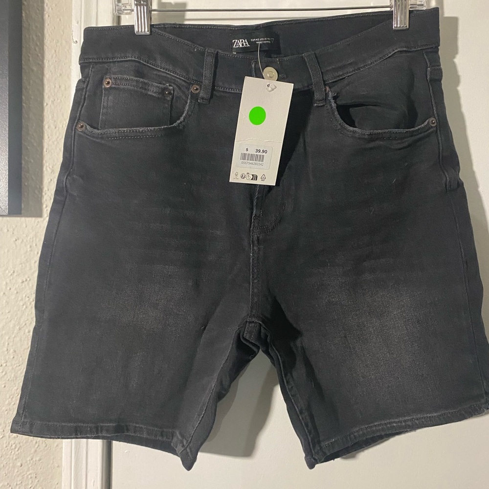 Black distressed denim jeans